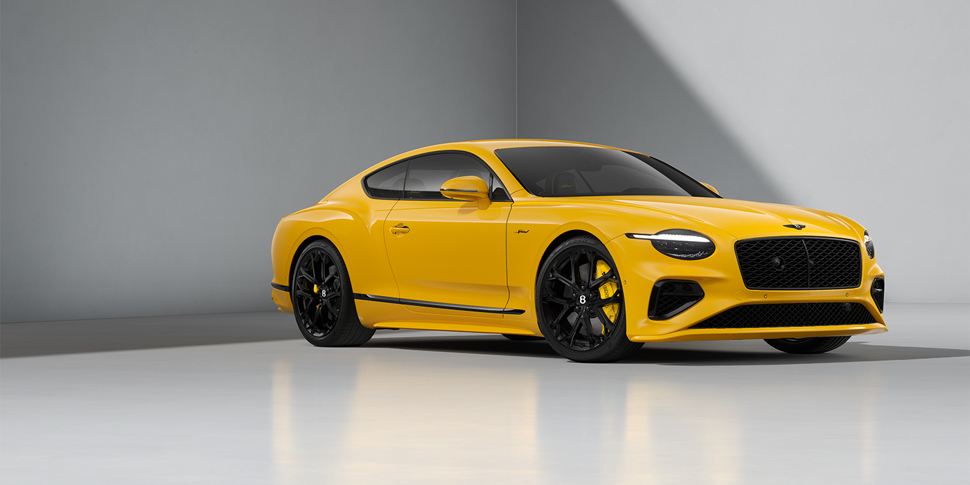 Bach Premium Cars GmbH Bentley Continental GT Speed coupe in Monaco Yellow paint and 22" Ten spoke sport wheels - front 3/4