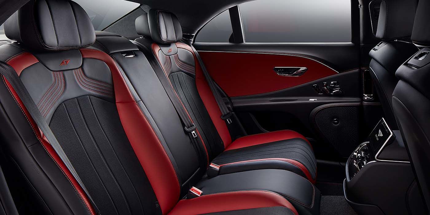 Bach Premium Cars GmbH Bentley Flying Spur S sedan rear interior in Beluga black and Hotspur red hide with S stitching