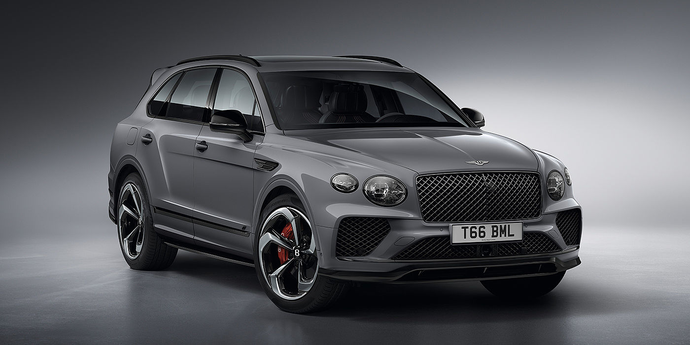 Bach Premium Cars GmbH Bentley Bentayga S in Cambrian Grey paint front three - quarter view with dark chrome matrix grille and featuring elliptical LED matrix headlights. 