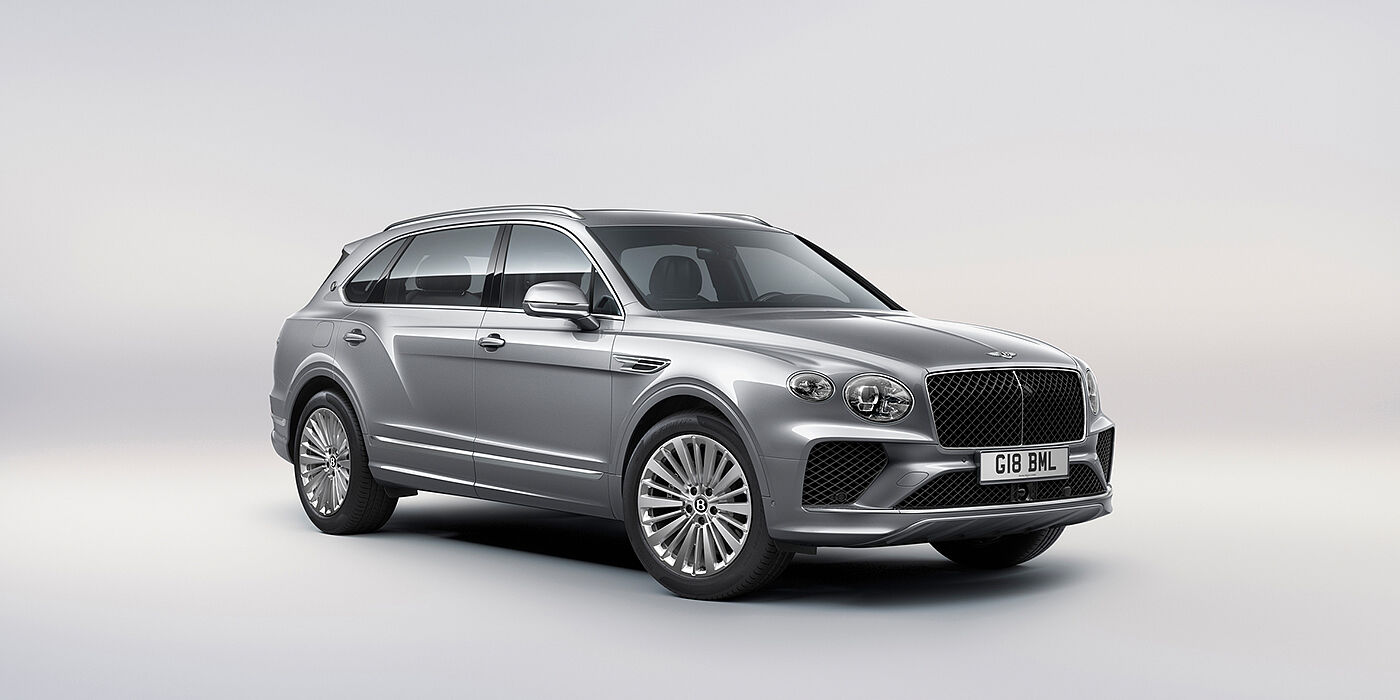 Bach Premium Cars GmbH Bentley Bentayga Extended Wheelbase luxury SUV front three quarter view in Moonbeam paint with 21 inch five spoke painted wheels