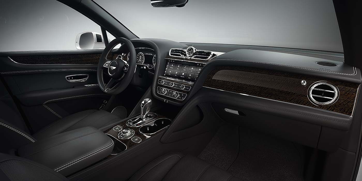 Bach Premium Cars GmbH Bentley Bentayga EWB SUV front interior in Beluga black leather and Dark Fiddleback Eucalyuptus veneer