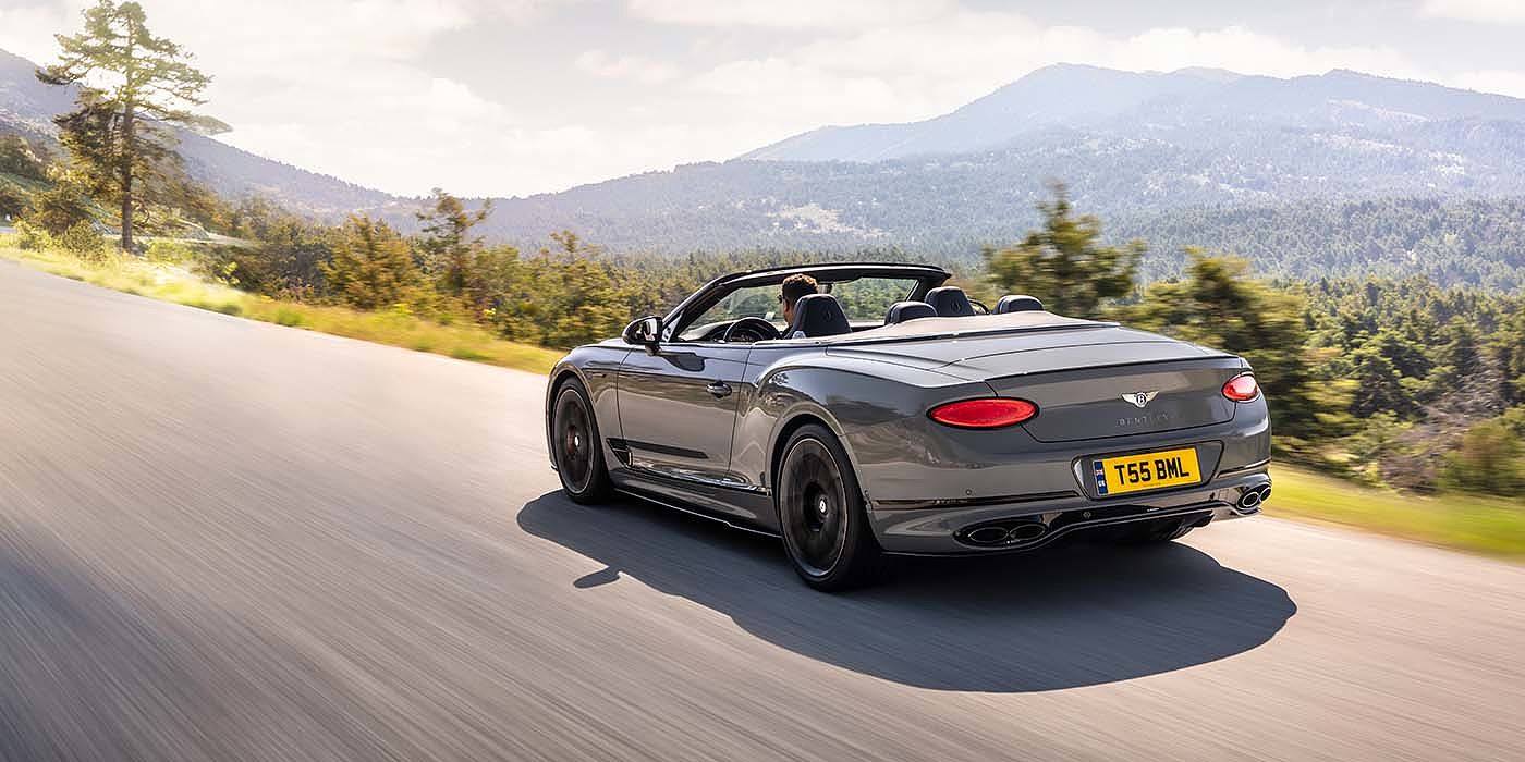 Bach Premium Cars GmbH Bentley Continental GTC S convertible in Cambrian Grey paint rear 34 dynamic driving