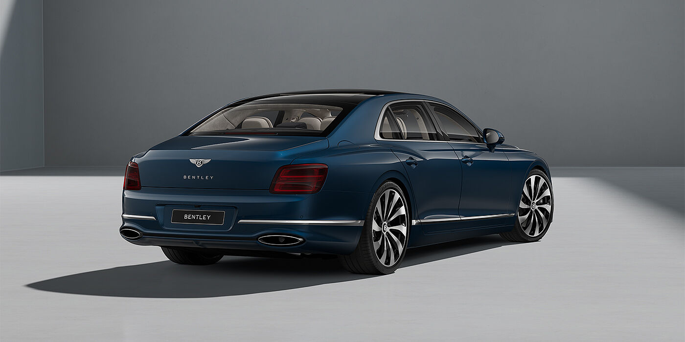 Bach Premium Cars GmbH New Bentley Flying Spur sedan in Marlin blue paint rear 3/4 with 22" Ten Spoke Black Painted and Bright Machined wheels