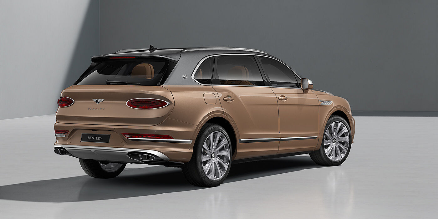 Bach Premium Cars GmbH Bentley Bentayga EWB Mulliner SUV in Magnetic and Rose Gold paint and 22" Mulliner wheels rear ¾