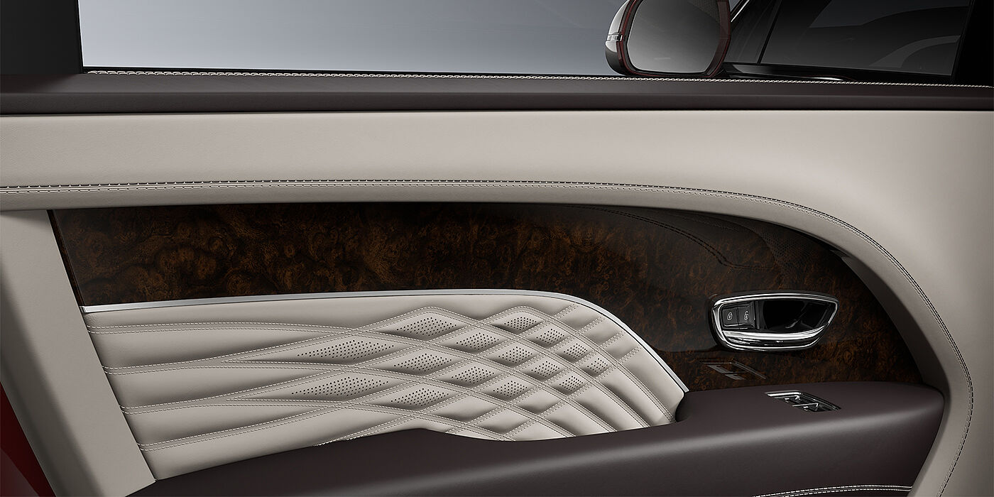 Bach Premium Cars GmbH Bentley Bentayga EWB Azure SUV door interior detail in Linen and Burnt Oak hides with Dark Stained Burr Walnut veneer