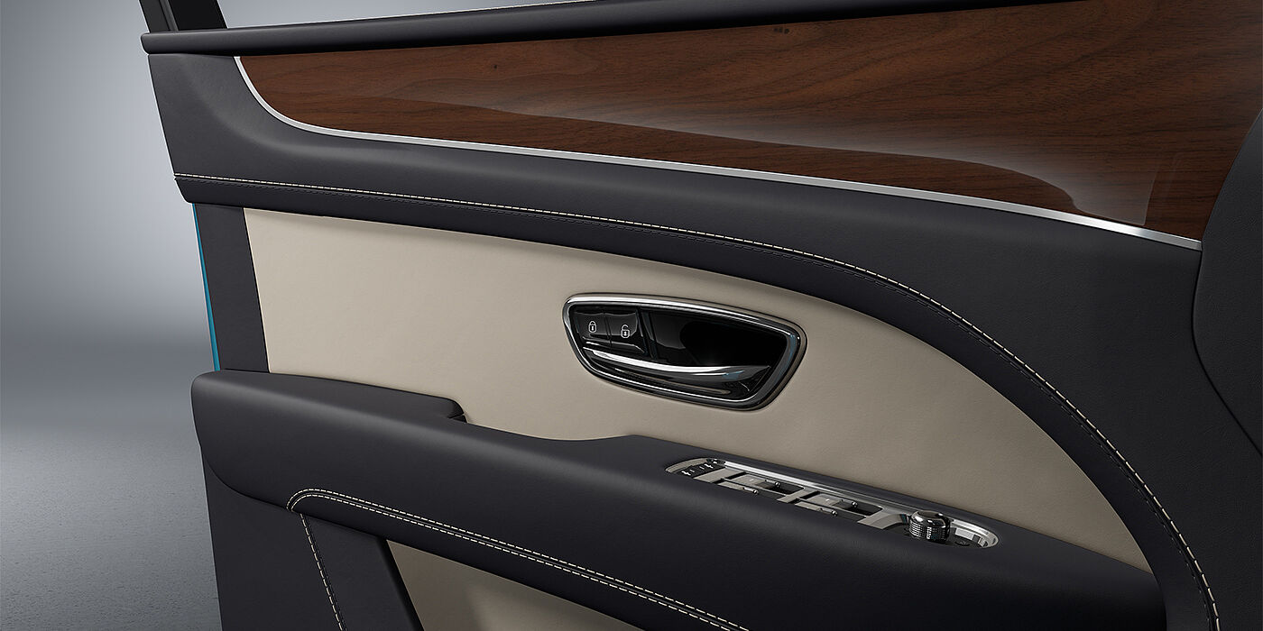 Bach Premium Cars GmbH Bentley Bentayga EWB SUV door interior detail in Portland and Imperial Blue hides with Crown Cut Walnut veneer