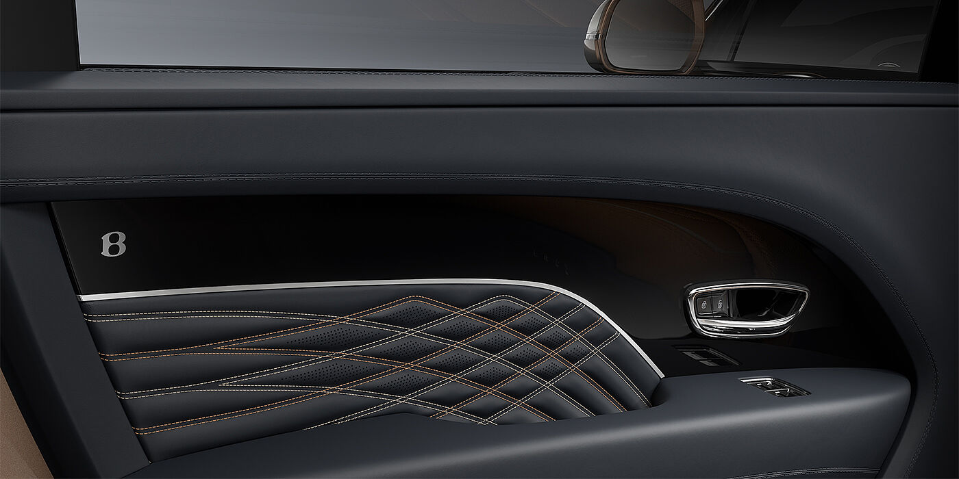 Bach Premium Cars GmbH Bentley Bentayga EWB Mulliner SUV door interior detail in Brunel hide and Grand Black veneer with Mulliner contrast stitching