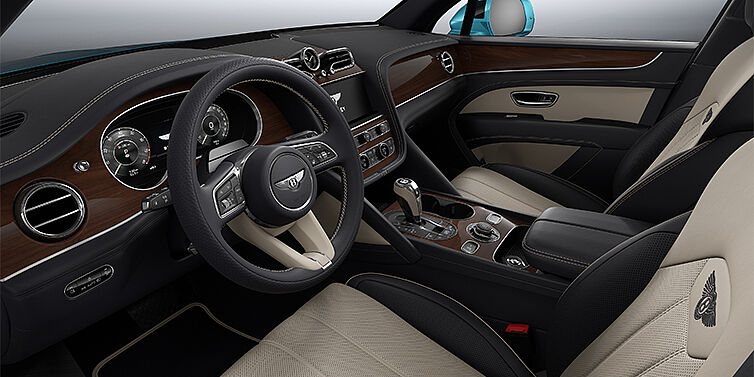 Bach Premium Cars GmbH Bentley Bentayga EWB SUV front interior in Portland and Imperial Blue hides with Crown Cut Walnut veneer