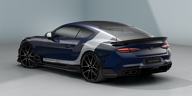 Bach Premium Cars GmbH Bentley Supersports rear three quarter in "Skies" Design theme with Electric Blue paint finish and Arctica white and Oxford blue paint stripes across the rear haunch.