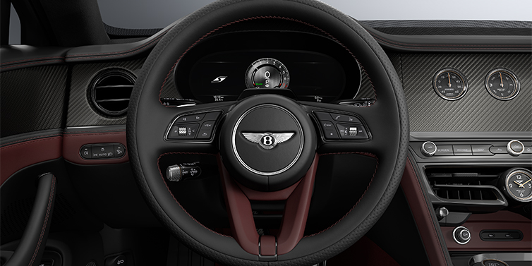 Bach Premium Cars GmbH New Bentley Flying Spur S sedan steering wheel and dash in Cricket Ball red and Beluga black hides and High Gloss Carbon Fibre veneer