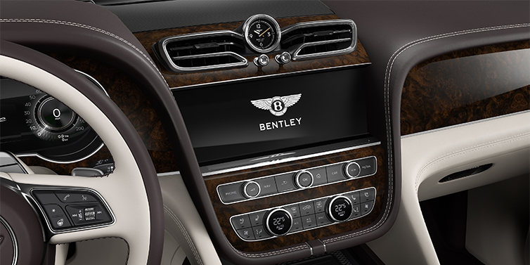 Bach Premium Cars GmbH Bentley Bentayga EWB Azure SUV centre console detail showing Bentley Wings